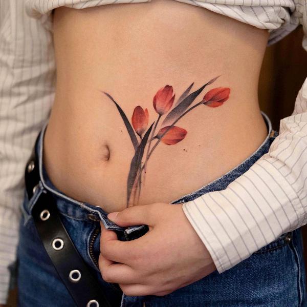 Tulip stomach tattoo