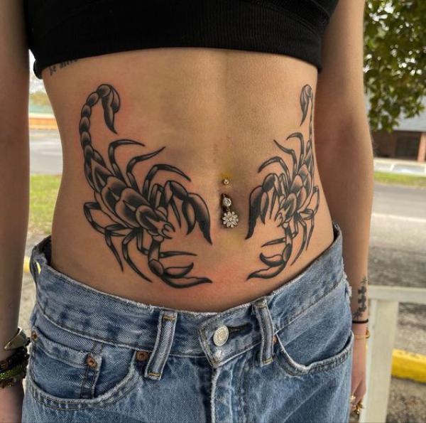 Two scorpions stomach tattoo
