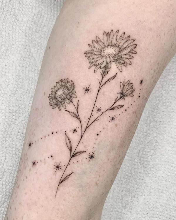 Virgo constellation and daisy flower tattoo