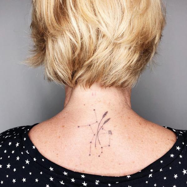 Virgo constellation and wheat tattoo