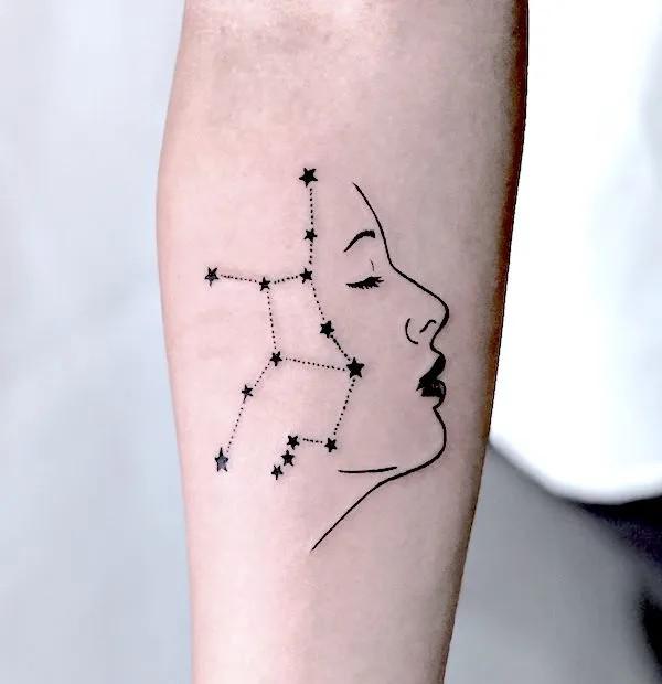 Virgo female face and constellation tattoo