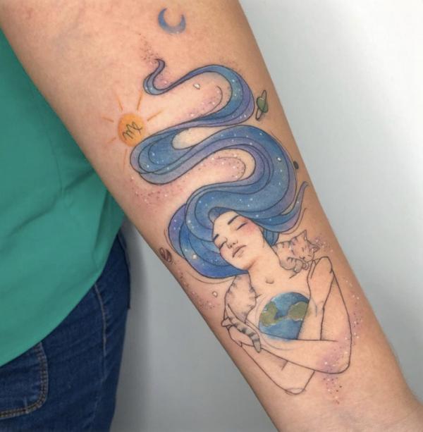 Virgo woman with cat tattoo