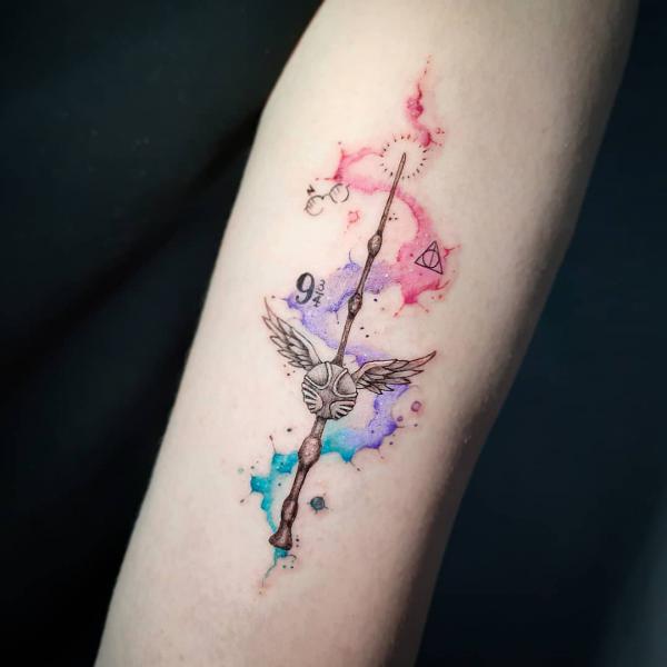 Wand and Golden Snitch with deathly hallows Nine and Three Quarters glasses tattoo
