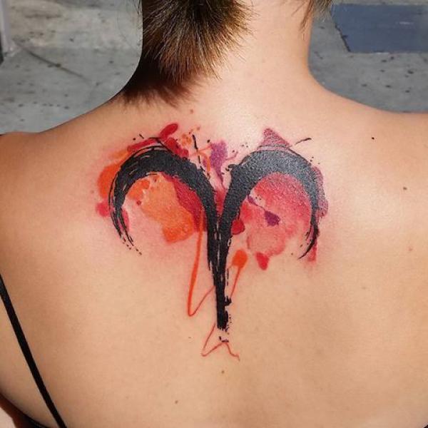 Watercolor Aries glyph back tattoo