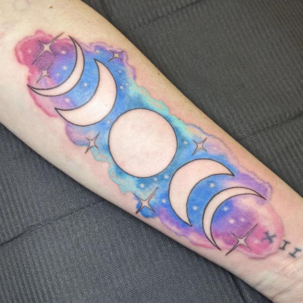 Watercolor Moon phases and stars tattoo