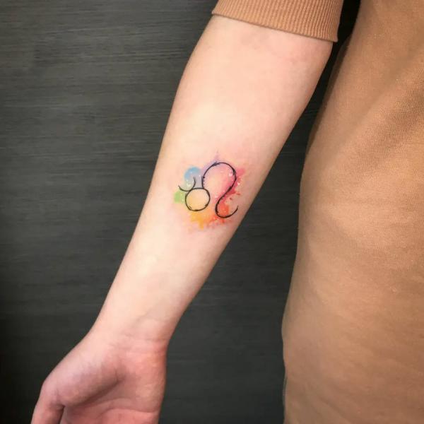 Watercolor leo glyph forearm tattoo