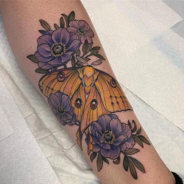 Yellow moth and flower tattoo