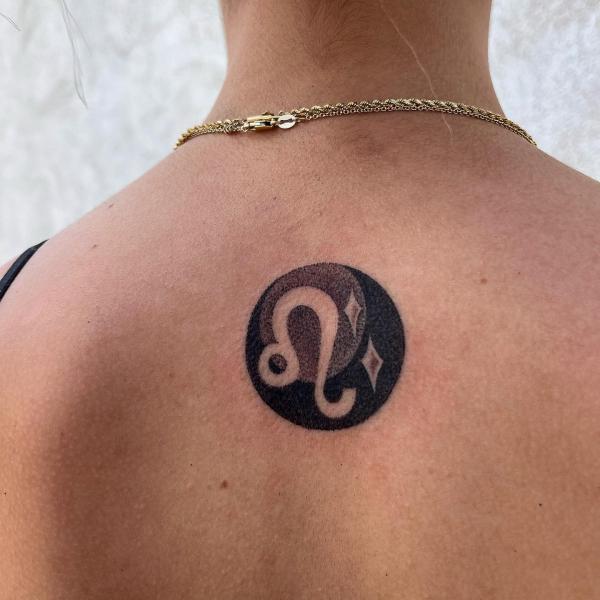 Yin yang leo tattoo