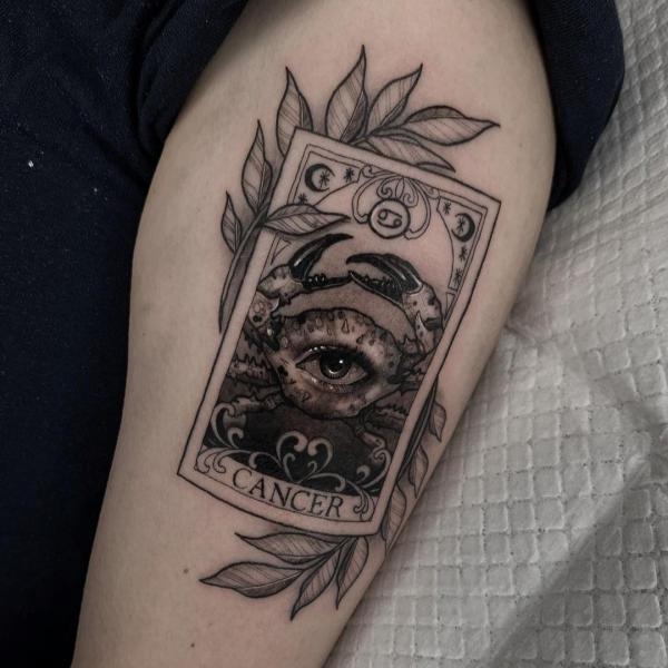 Zodiac cancer card with eye tattoo