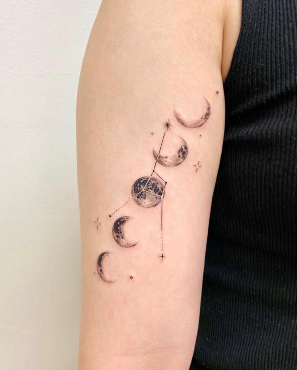 Zodiac cancer constellation with moon phases tattoo