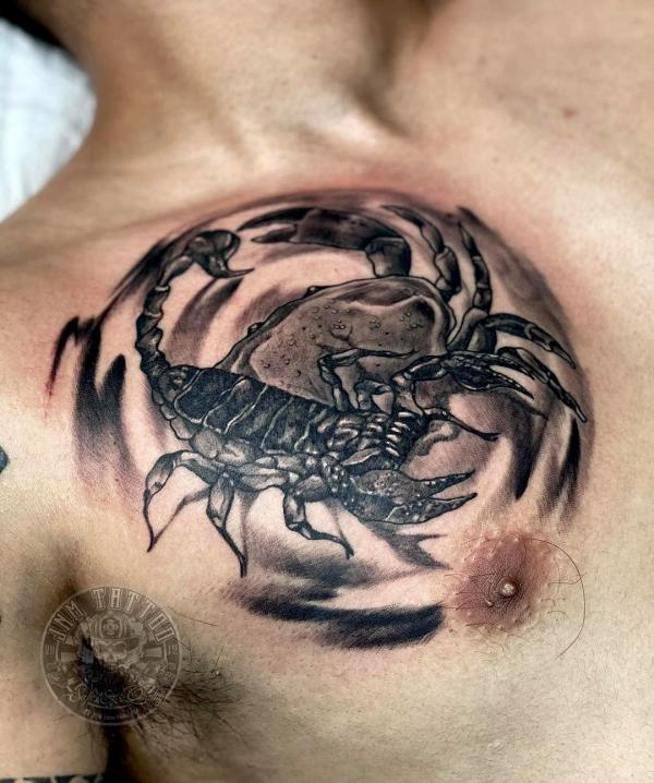Zodiac cancer crab and scorpion chest tattoo