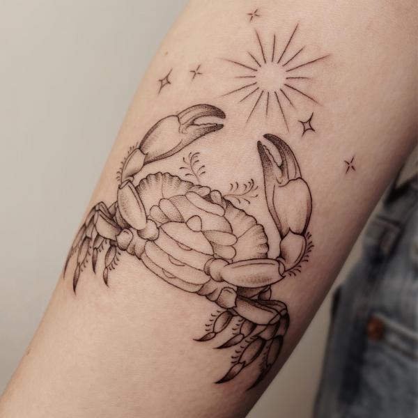Zodiac cancer crab with sun and stars