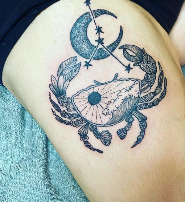 Zodiac cancer crab with sun and wave and crescent moon