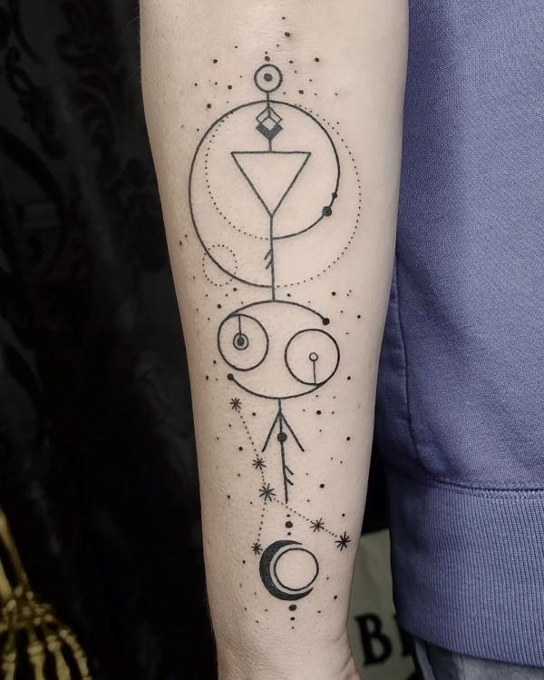 Zodiac cancer forearm tattoo