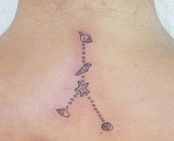 Zodiac cancer shell constellation tattoo