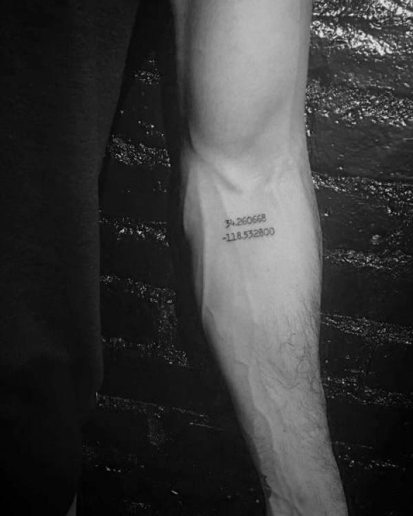 coordinates tattoo below inner elbow tattoo
