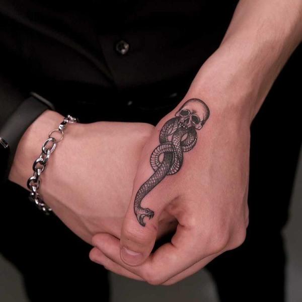 death eater finger tattoo