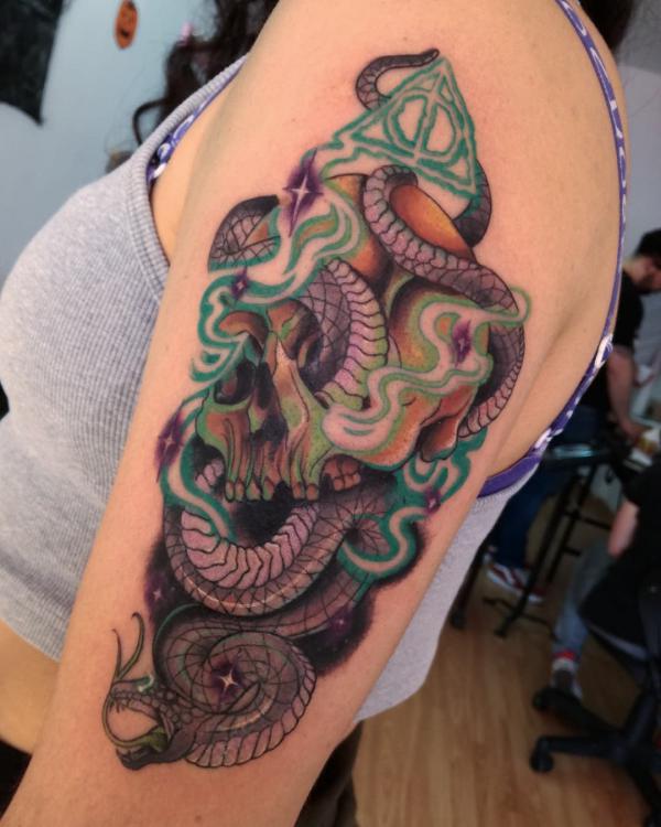 death eater with green deathly hallows tattoo