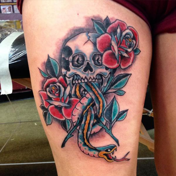 death eater with traditional rose tattoo on thigh