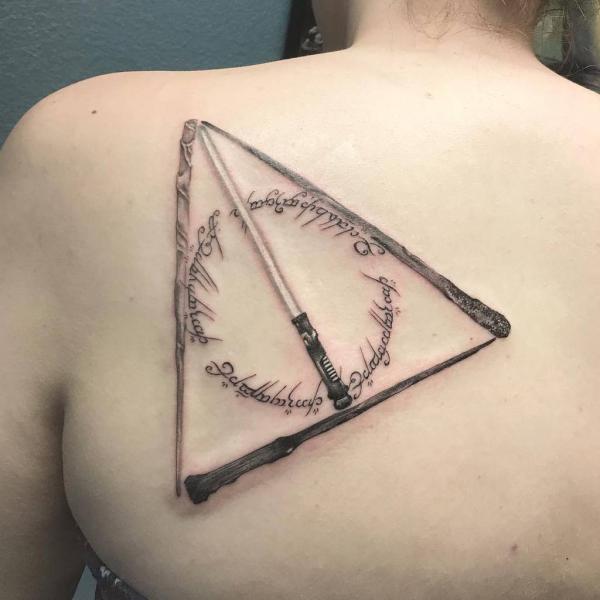 deathly hallows shoulder blade tattoo