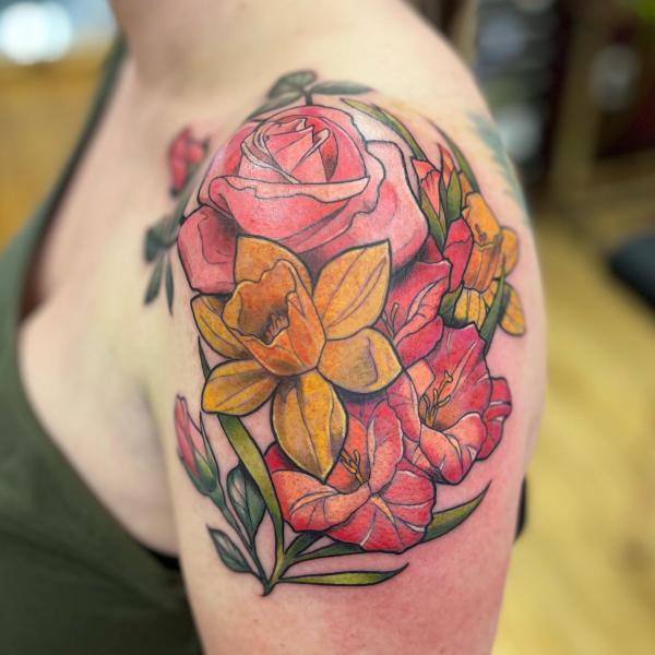 gladiolus and daffodil and rose shoulder tattoo