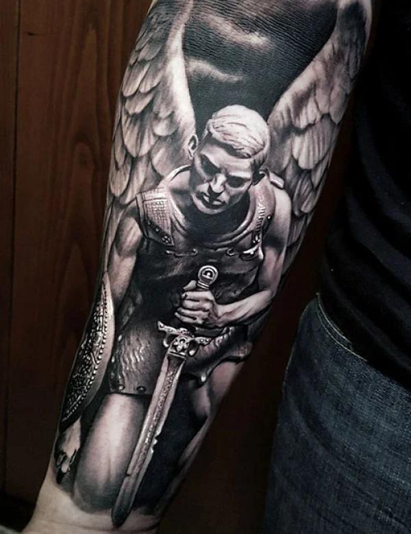 kneeling Saint Michael Forearm Tattoo blackwork