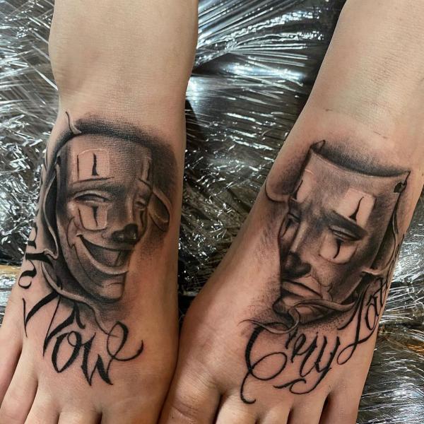laugh now cry later feet tattoo