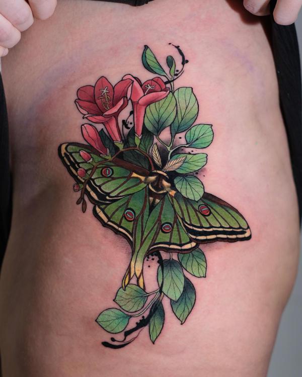 luna moth and copihue flower tattoo