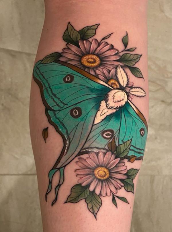 luna moth and daisy tattoo