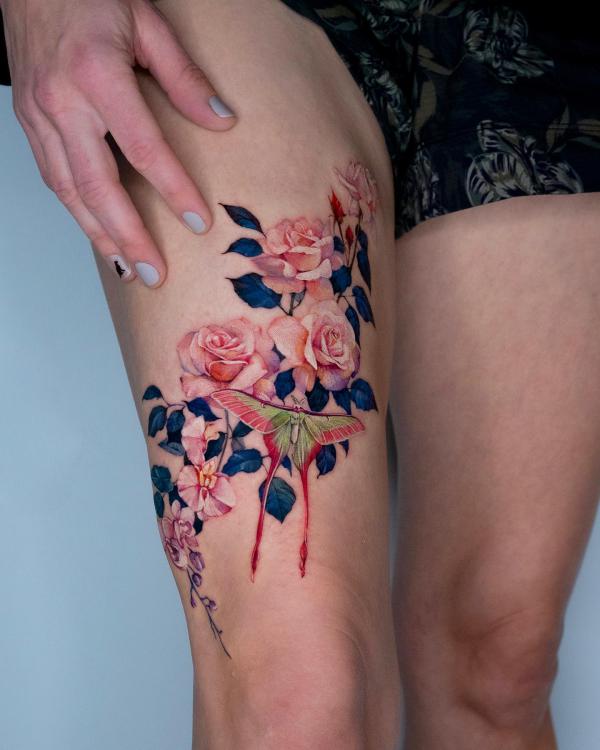 luna moth and rose thigh tattoo