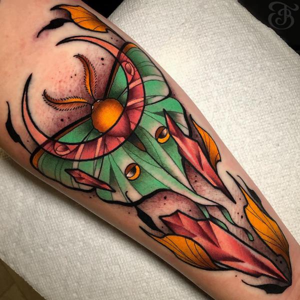 luna moth with crescent moon tattoo