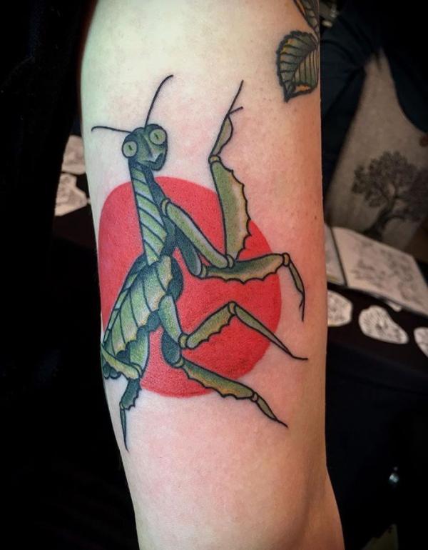praying mantis and sun tattoo