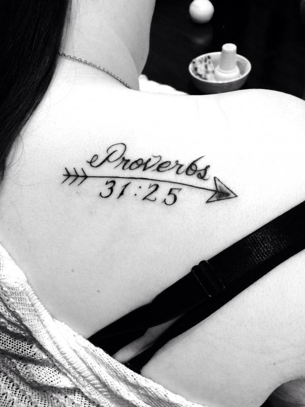 proverbs 31 25 with arrow tattoo shoulder