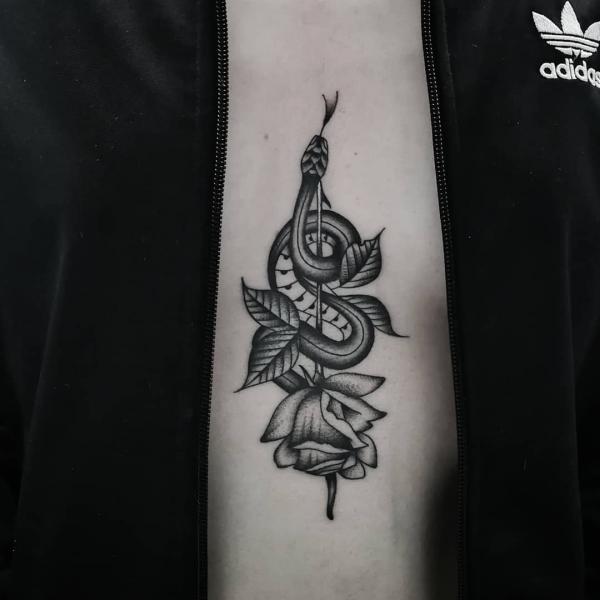 rose and snake dotwork tattoo forearm