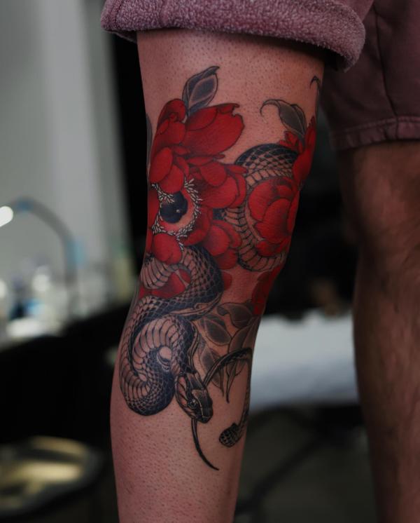 snake and rose leg tattoo