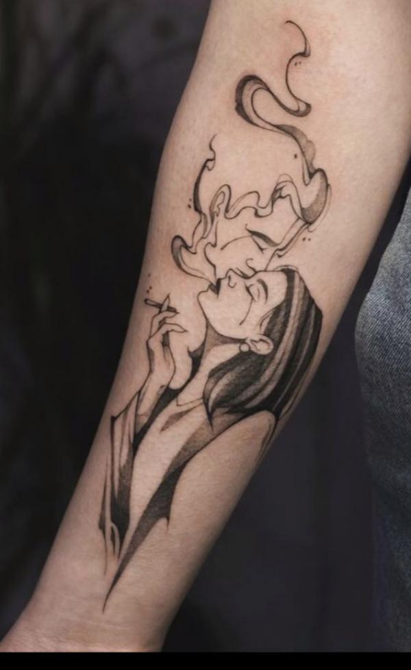 A woman smoking forearm tattoo
