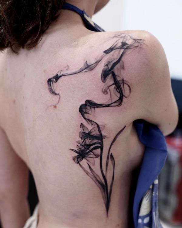 Abstract flower with smoke tattoo back