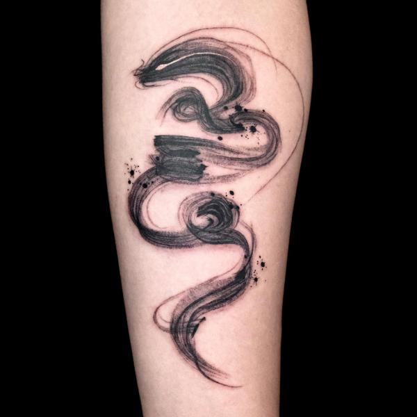 Abstract smoke dragon tattoo