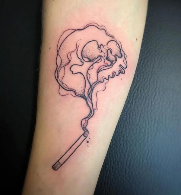 Abstract smoke skull tattoo