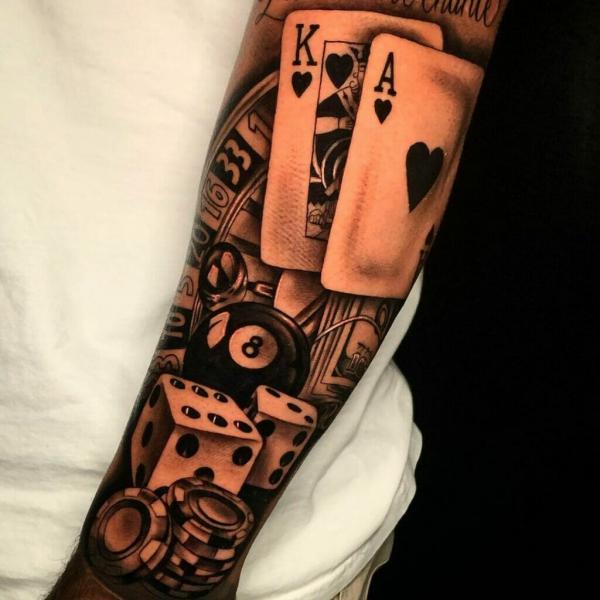 Ace and King of spades with dices tattoo