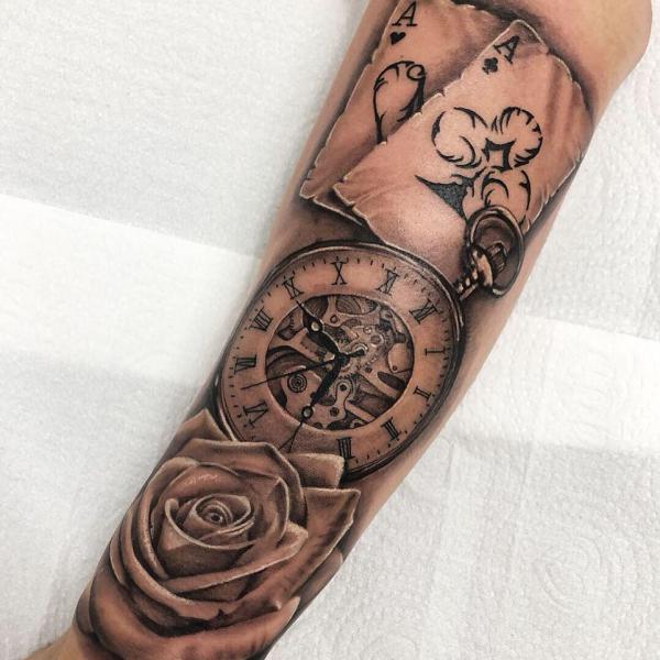 Ace of spade clock and rose tattoo forearm