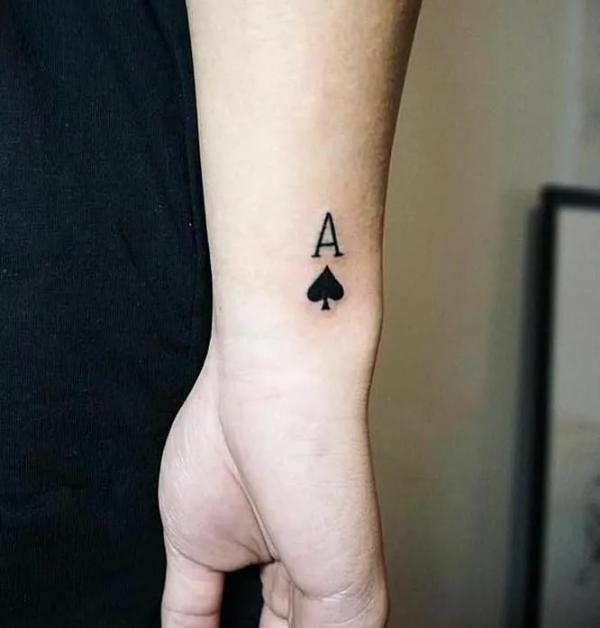 Ace of spade tattoo wrist