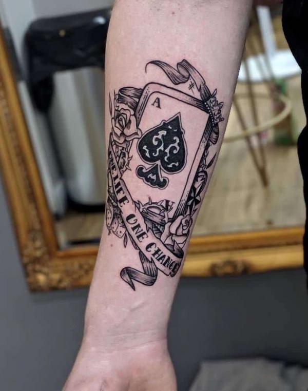 Ace of spade with dice and roses tattoo