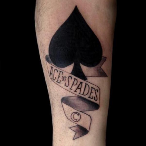 Ace of spade with ribbon tattoo