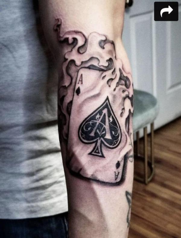 Ace of spades in flame tattoo black and grey