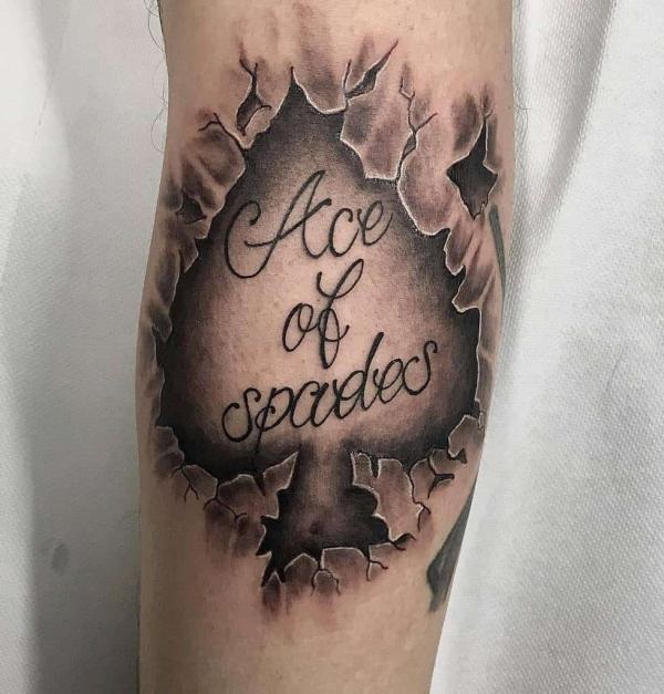 Ace of spades ripped skin tattoo