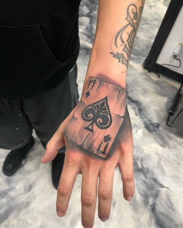 Ace of spades tattoo hand