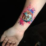 An icosahedron dice tattoo watercolor