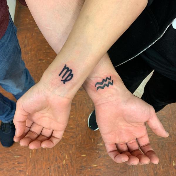 Aquarius and Virgo tattoo wrist