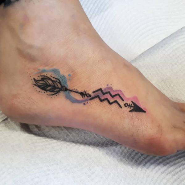 Aquarius and sagittarius arrow tattoo foot
